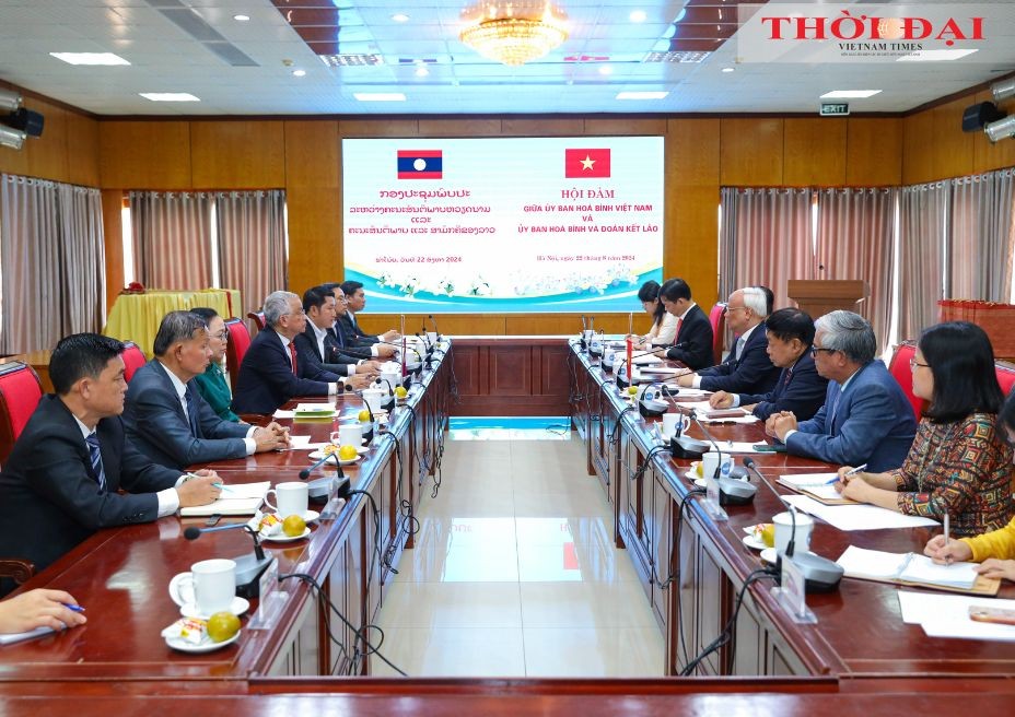 The Vietnam Peace Committee and Lao Committee for Peace and Solidarity held talks. (Photo: Dinh Hoa) The Vietnam Peace Committee and Lao Committee for Peace and Solidarity held talks. (Photo: Dinh Hoa)