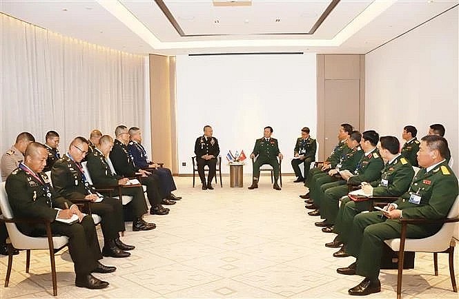 Chief of the General Staff of the Vietnam People's Army (VPA) and Deputy Minister of National Defence Sen. Lieut. Gen Nguyen Tan Cuong meets with Gen. Songwit Noonpackdee, Chief of Defence Forces of the Royal Thai Armed Forces (Photo: VNA) Chief of the General Staff of the Vietnam People's Army (VPA) and Deputy Minister of National Defence Sen. Lieut. Gen Nguyen Tan Cuong meets with Gen. Songwit Noonpackdee, Chief of Defence Forces of the Royal Thai Armed Forces (Photo: VNA)