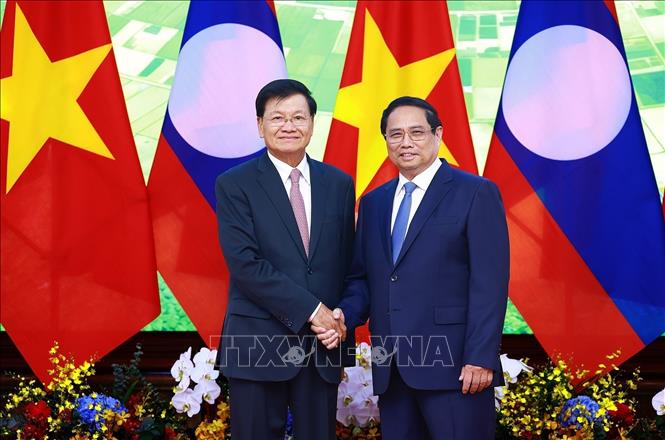 Tổng Bí thư, Chủ tịch nước Lào kết thúc tốt đẹp chuyến thăm cấp Nhà nước đến Việt Nam Chú thích ảnh