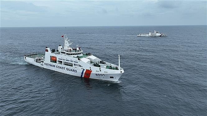 In the hypothetical scenario, the Vietnamese and Indonesian coast guard ships receive an SOS signal from a vessel on fire while on a joint patrol (Photo: VNA) In the hypothetical scenario, the Vietnamese and Indonesian coast guard ships receive an SOS signal from a vessel on fire while on a joint patrol (Photo: VNA)