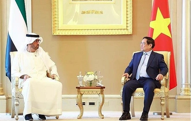 PM Pham Minh Chinh (R) and UAE Minister of Industry and Advanced Technology Sultan bin Ahmed Al Jaber, who is also Group CEO of the Abu Dhabi National Oil Company, at their meeting in Abu Dhabi. PM Pham Minh Chinh (R) and UAE Minister of Industry and Advanced Technology Sultan bin Ahmed Al Jaber, who is also Group CEO of the Abu Dhabi National Oil Company, at their meeting in Abu Dhabi.