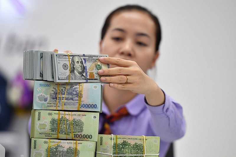 Ngược chiều thế giới, tỷ giá VND/USD đi xuống Ngược chiều thế giới, tỷ giá VND/USD đi xuống