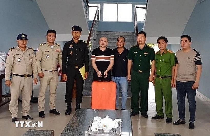 Vietnamese and Cambodian authorities have joined hands to combat crimes. (Photo: VNA) Vietnamese and Cambodian authorities have joined hands to combat crimes. (Photo: VNA)