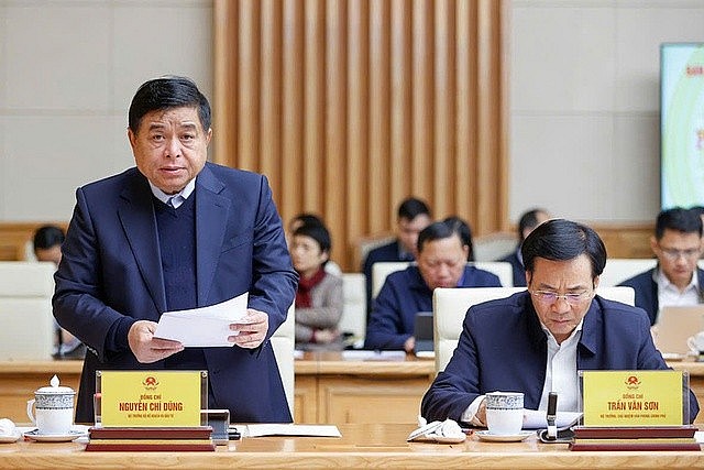 Minister of Planning and Investment Nguyen Chi Dung (left) addresses the irst meeting of the National Steering Committee for Semiconductor Industry Development in Ha held Noi on December 14, 2024. Photo: VGP Minister of Planning and Investment Nguyen Chi Dung (left) addresses the irst meeting of the National Steering Committee for Semiconductor Industry Development in Ha held Noi on December 14, 2024. Photo: VGP
