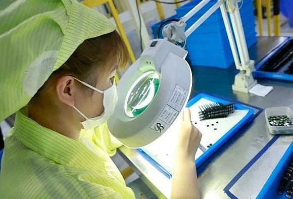 Production of electronics components at Youngbag Micromotor Co. Ltd. in Binh Xuyen Industrial Zone in Vinh Phuc province. Production of electronics components at Youngbag Micromotor Co. Ltd. in Binh Xuyen Industrial Zone in Vinh Phuc province.