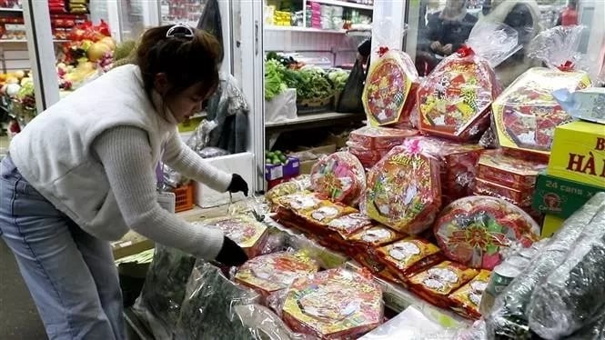 Stalls serving Vietnamese Lunar New Year at Sadovod market, Moscow, Russia.