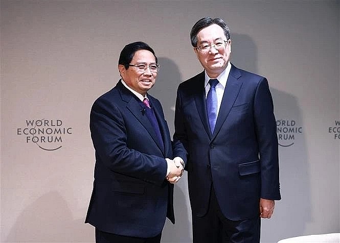 PM Pham Minh Chinh (L) and Permanent Vice Premier of the State Council of China Ding Xuexiang. (Photo: VNA) PM Pham Minh Chinh (L) and Permanent Vice Premier of the State Council of China Ding Xuexiang. (Photo: VNA)