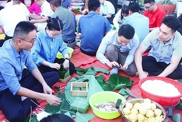 At a traditional banh chung making event in Phnom Penh on January 27. At a traditional banh chung making event in Phnom Penh on January 27.