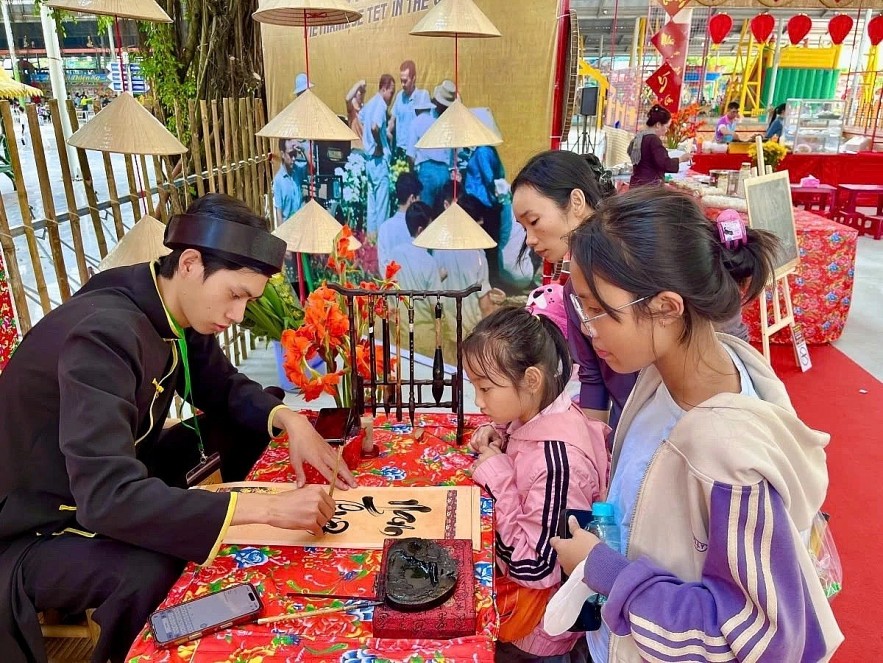 Asking for lucky scripts at Suoi Tien Cultural Tourism Park. Asking for lucky scripts at Suoi Tien Cultural Tourism Park.