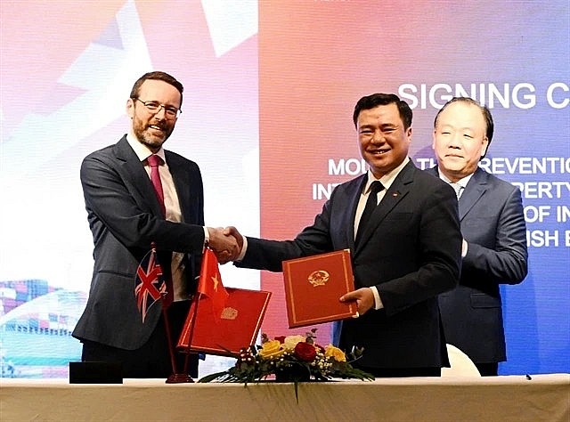An MoU on preventing counterfeit and IP infringement in Vietnam was signed at the conference, 'The UK’s Accession to CPTPP' organised on February 19 in Hanoi. (Photo courtesy of British Embassy in Vietnam) An MoU on preventing counterfeit and IP infringement in Vietnam was signed at the conference, 'The UK’s Accession to CPTPP' organised on February 19 in Hanoi. (Photo courtesy of British Embassy in Vietnam)