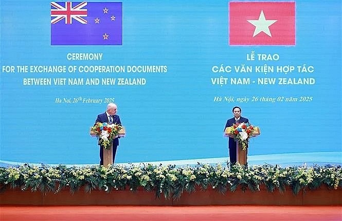Prime Minister Pham Minh Chinh and New Zealand Prime Minister Christopher Luxon at the joint press conference announcing the outcomes of their official talks and the exchange of cooperation documents between the two countries on February 26. (Photo: VNA) Prime Minister Pham Minh Chinh and New Zealand Prime Minister Christopher Luxon at the joint press conference announcing the outcomes of their official talks and the exchange of cooperation documents between the two countries on February 26. (Photo: VNA)