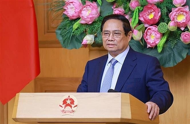 Prime Minister Pham Minh Chinh speaks at the dialogue with the US business community in Hanoi on May 13. (Photo: VNA) Prime Minister Pham Minh Chinh speaks at the dialogue with the US business community in Hanoi on May 13. (Photo: VNA)