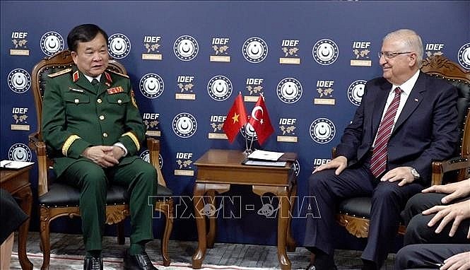 Visiting Deputy Minister of National Defence Sen. Lt. Gen. Hoang Xuan Chien (L) and Turkish Minister of National Defence Yasar Guler during their meeting on July 22. Visiting Deputy Minister of National Defence Sen. Lt. Gen. Hoang Xuan Chien (L) and Turkish Minister of National Defence Yasar Guler during their meeting on July 22.
