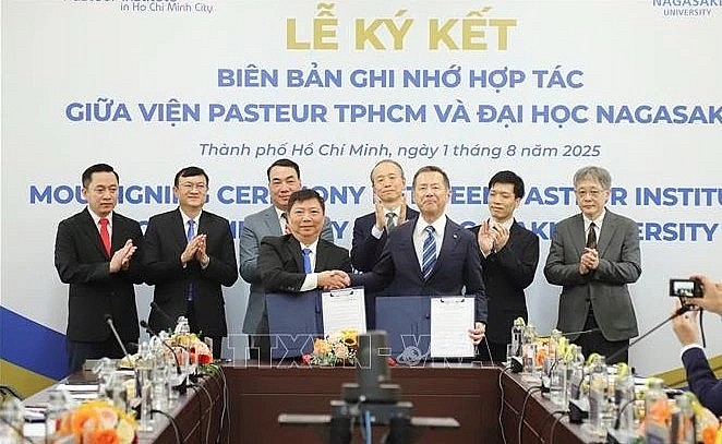 At the MoU signing ceremony (Photo:VNA)