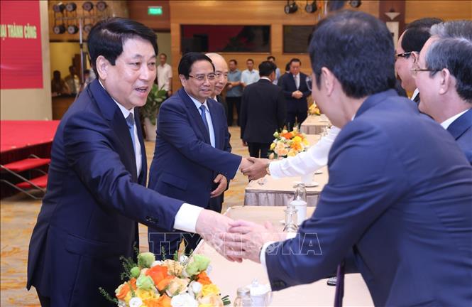 Chủ tịch nước và Thủ tướng Chính phủ gặp mặt đại biểu các tầng lớp nhân dân Chú thích ảnh