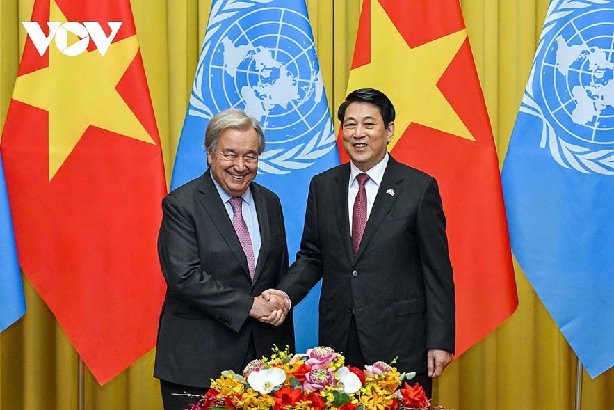 Vietnamese President Luong Cuong (R) shakes hands with UN Secretary General Antonio Guterres ahead of their talks in Hanoi on October 24.