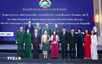 Tiệc chiêu đãi kỷ niệm 50 năm Quốc khánh Lào tại Hà Nội: Thắt chặt tình hữu nghị Việt - Lào