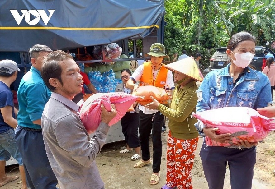 Local residents in Khanh Hoa province receive emergency aid in the wake of the flood Local residents in Khanh Hoa province receive emergency aid in the wake of the flood