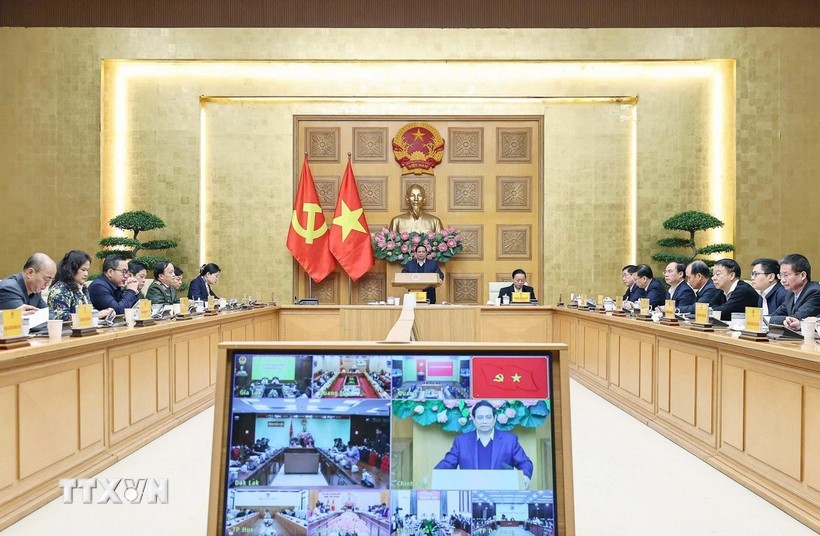 Prime Minister Pham Minh Chinh chaired a meeting on building houses for people affected by storms and floods. (Photo: Duong Giang/VNA) Prime Minister Pham Minh Chinh chaired a meeting on building houses for people affected by storms and floods. (Photo: Duong Giang/VNA)