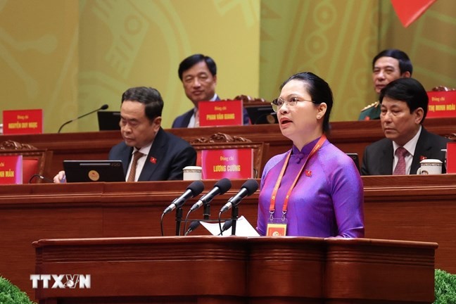 Đồng chí Hà Thị Nga, Ủy viên Trung ương Đảng, Phó Bí thư Thường trực Đảng ủy Mặt trận Tổ quốc, các đoàn thể Trung ương, Phó Chủ tịch - Tổng Thư ký Ủy ban Trung ương Mặt trận Tổ quốc Việt Nam trình bày tham luận tại Đại hội. (Ảnh: TTXVN) Đồng chí Hà Thị Nga, Ủy viên Trung ương Đảng, Phó Bí thư Thường trực Đảng ủy Mặt trận Tổ quốc, các đoàn thể Trung ương, Phó Chủ tịch - Tổng Thư ký Ủy ban Trung ương Mặt trận Tổ quốc Việt Nam trình bày tham luận tại Đại hội. (Ảnh: TTXVN)