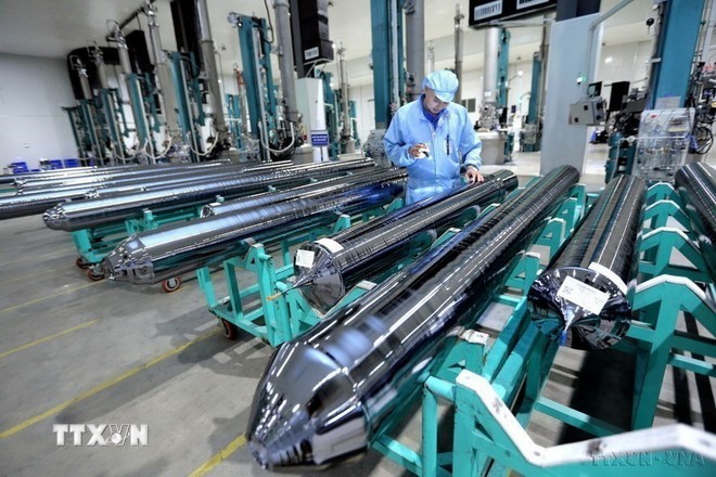 Manufacturing materials for solar panel production at JA Solar Vietnam Co., Ltd., a Hong Kong (China)-invested enterprise, at Quang Chau Industrial Park in Bac Giang province. (Photo: VNA) Manufacturing materials for solar panel production at JA Solar Vietnam Co., Ltd., a Hong Kong (China)-invested enterprise, at Quang Chau Industrial Park in Bac Giang province. (Photo: VNA)