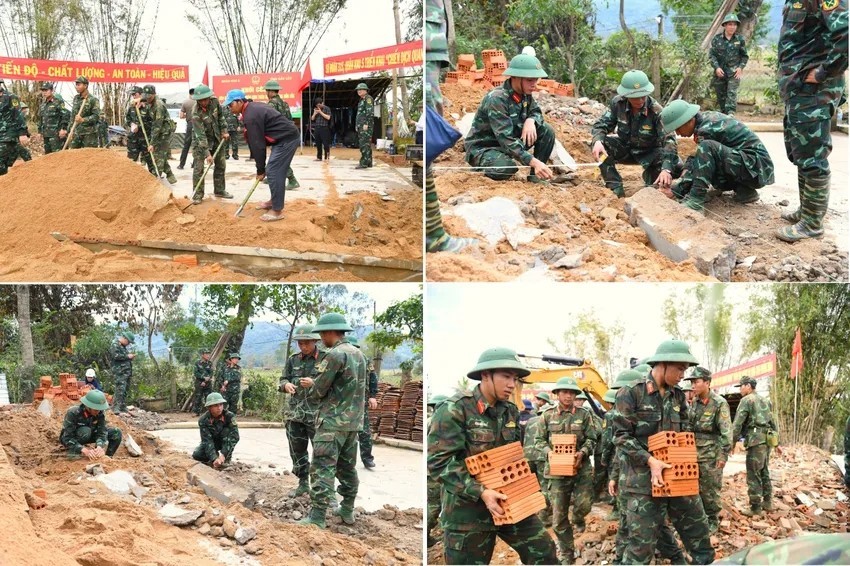 Military forces support the rebuilding of houses during the “Quang Trung Campaign.” (Photo: Military Region 5) Military forces support the rebuilding of houses during the “Quang Trung Campaign.” (Photo: Military Region 5)