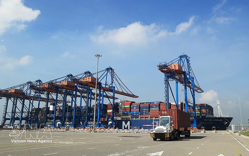 Container trucks operate at Gemalink International Port, part of the Cai Mep port complex in Tan Phuoc ward. (Photo: VNA) Container trucks operate at Gemalink International Port, part of the Cai Mep port complex in Tan Phuoc ward. (Photo: VNA)