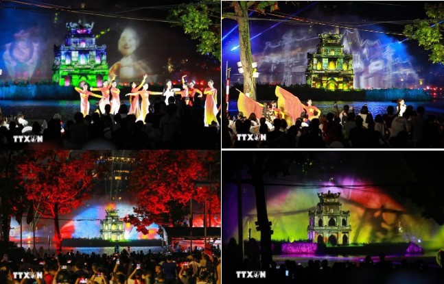 3D mapping light shows projected onto Turtle Tower in the heart of the capital, combined with a water-screen system, offer visitors a unique and engaging experience. (Photo: VNA)