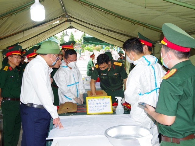Nghe An province collects DNA samples from unidentified martyrs’ remains. (Photo: Thuong Hieu va Cong Luan Newspaper)