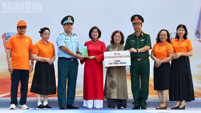 The program introduces the book Ho Chi Minh City Holds Walk for Agent Orange/Dioxin Victims
