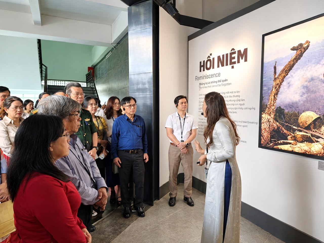 Visitors listen to an introduction to the “Requiem” thematic exhibition. (Photo: War Remnants Museum)