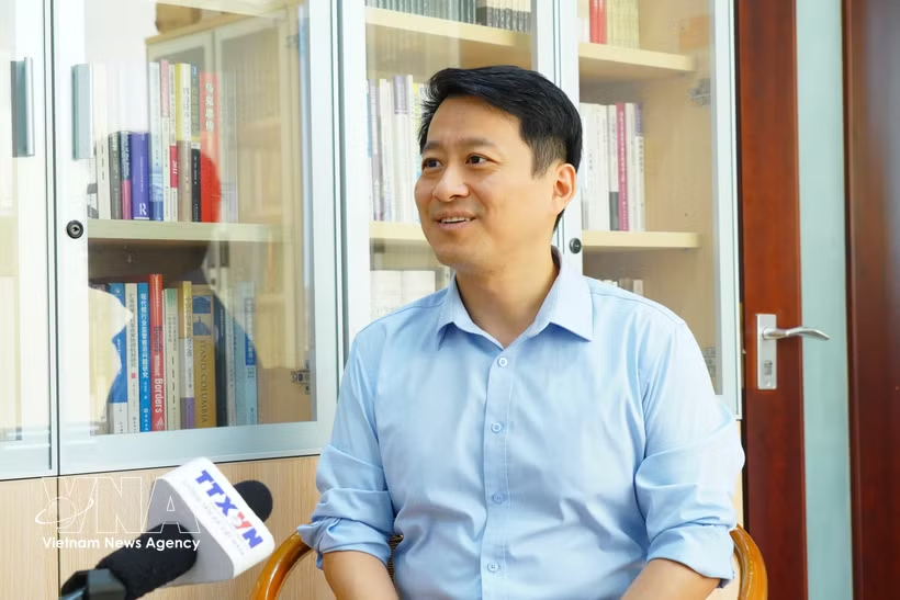 Professor Qu Qiang of Minzu University of China speaks to a Vietnam News Agency correspondent in Beijing. (Photo: VNA) Professor Qu Qiang of Minzu University of China speaks to a Vietnam News Agency correspondent in Beijing. (Photo: VNA)