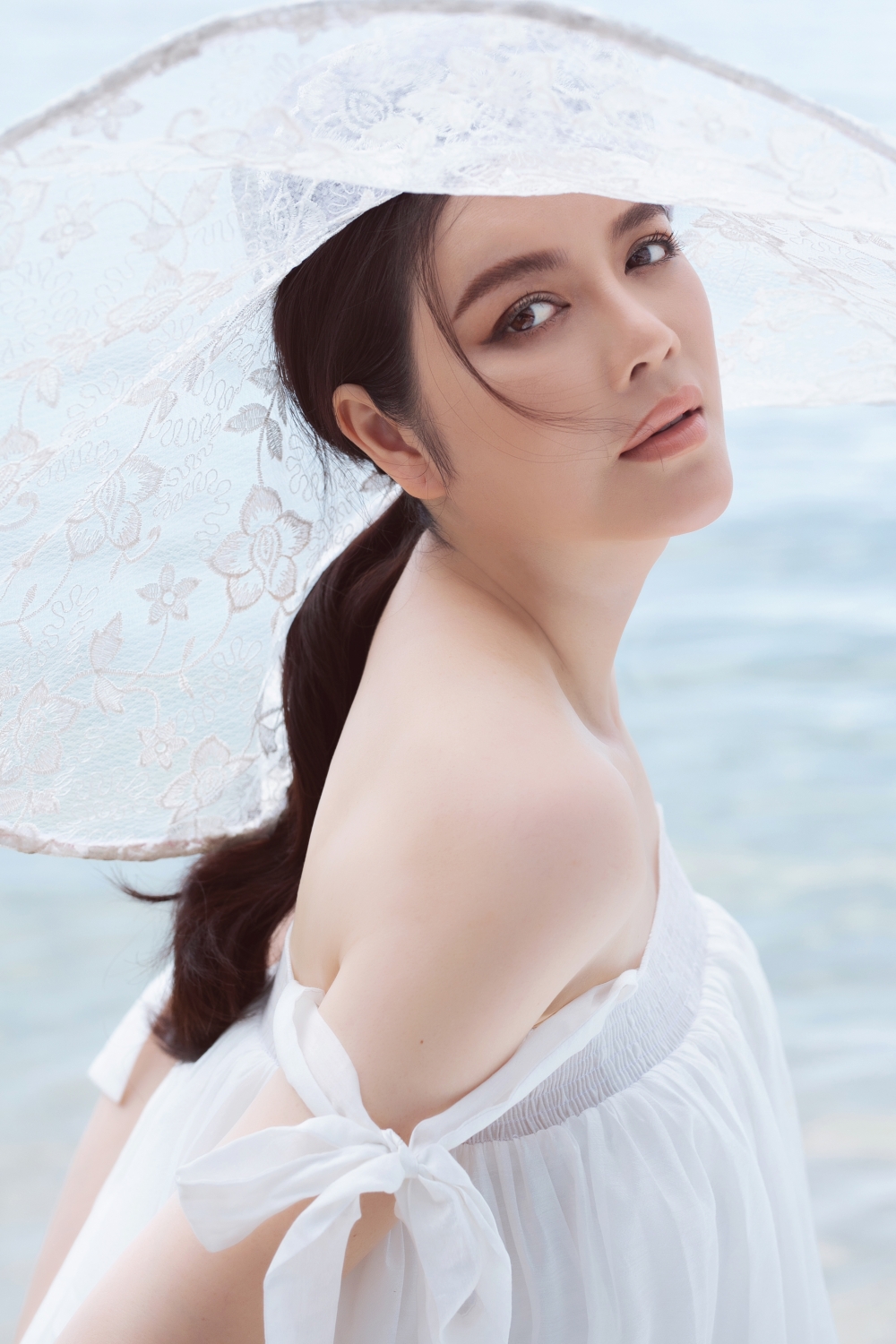 Lý Nhã Kỳ khoe nhan sắc bay bổng với những shoot hình ở bãi biển 1922 linh6066