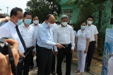 ປະທານປະເທດຫງວຽນຊວັນຟຸກ ໄປກວດກາວຽກງານປ້ອງກັນ, ສະກັດກັ້ນ COVID-19 ຢູ່ ດ່ານັ້ງ