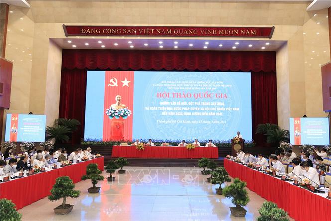 Chủ tịch nước chủ trì Hội thảo quốc gia lần thứ ba về xây dựng Nhà nước pháp quyền Chú thích ảnh