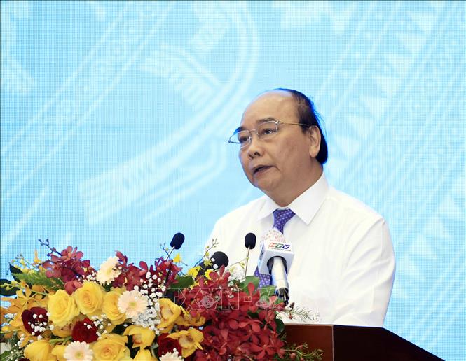 Chủ tịch nước chủ trì Hội thảo quốc gia lần thứ ba về xây dựng Nhà nước pháp quyền Chú thích ảnh