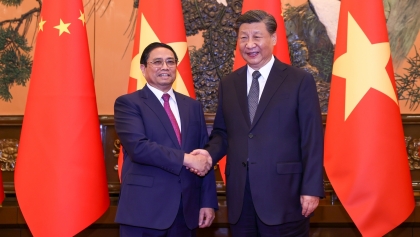 政府总理范明政会见中共中央总书记中国国家主席习近平