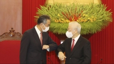 越共中央总书记阮富仲会见中国国务委员兼外交部长王毅