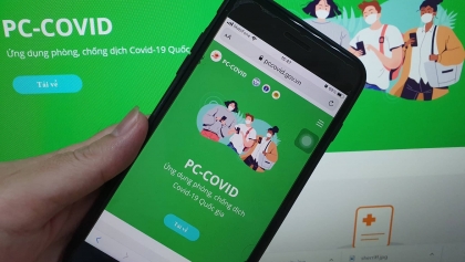 胡志明市：使用PC-COVID应用程序参与社会经济活动