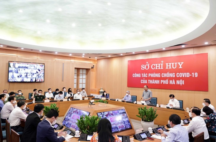 阮春福相信河内是有能力越过所有困难的典范 阮春福相信河内是有能力越过所有困难的典范
