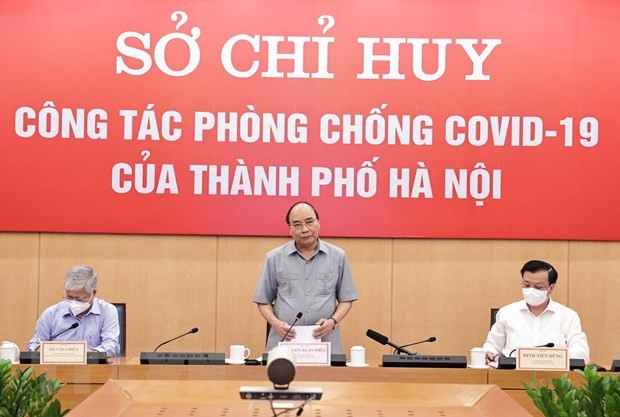 越南国家主席阮春福:有人民的同心和支持,我们必将成功控制疫情 越南国家主席阮春福:有人民的同心和支持,我们必将成功控制疫情