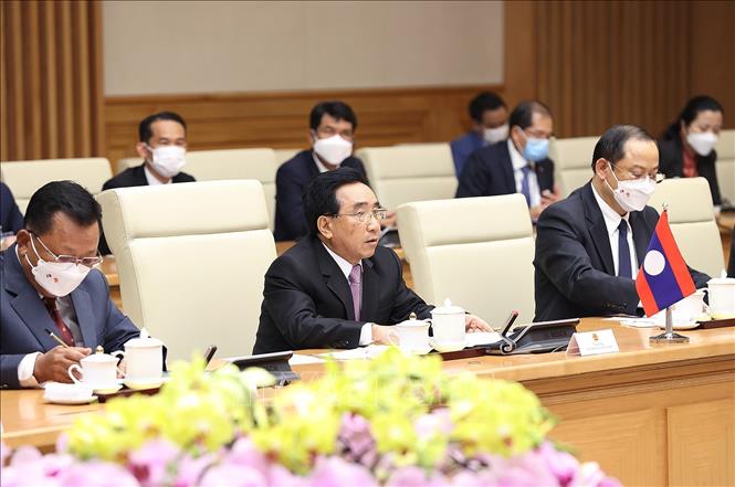Thủ tướng Phạm Minh Chính hội đàm với Thủ tướng Lào Phankham Viphavanh Chú thích ảnh