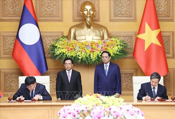 Thủ tướng Phạm Minh Chính hội đàm với Thủ tướng Lào Phankham Viphavanh Chú thích ảnh