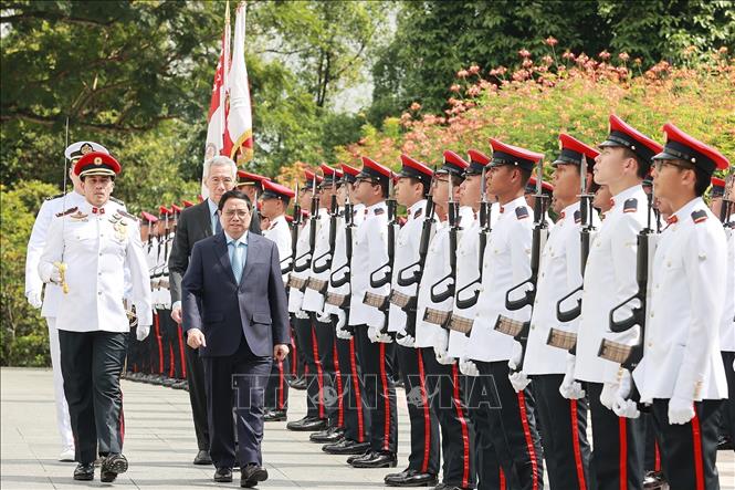 Chuyến thăm Singapore của Thủ tướng Phạm Minh Chính đem lại kết quả thiết thực Chú thích ảnh