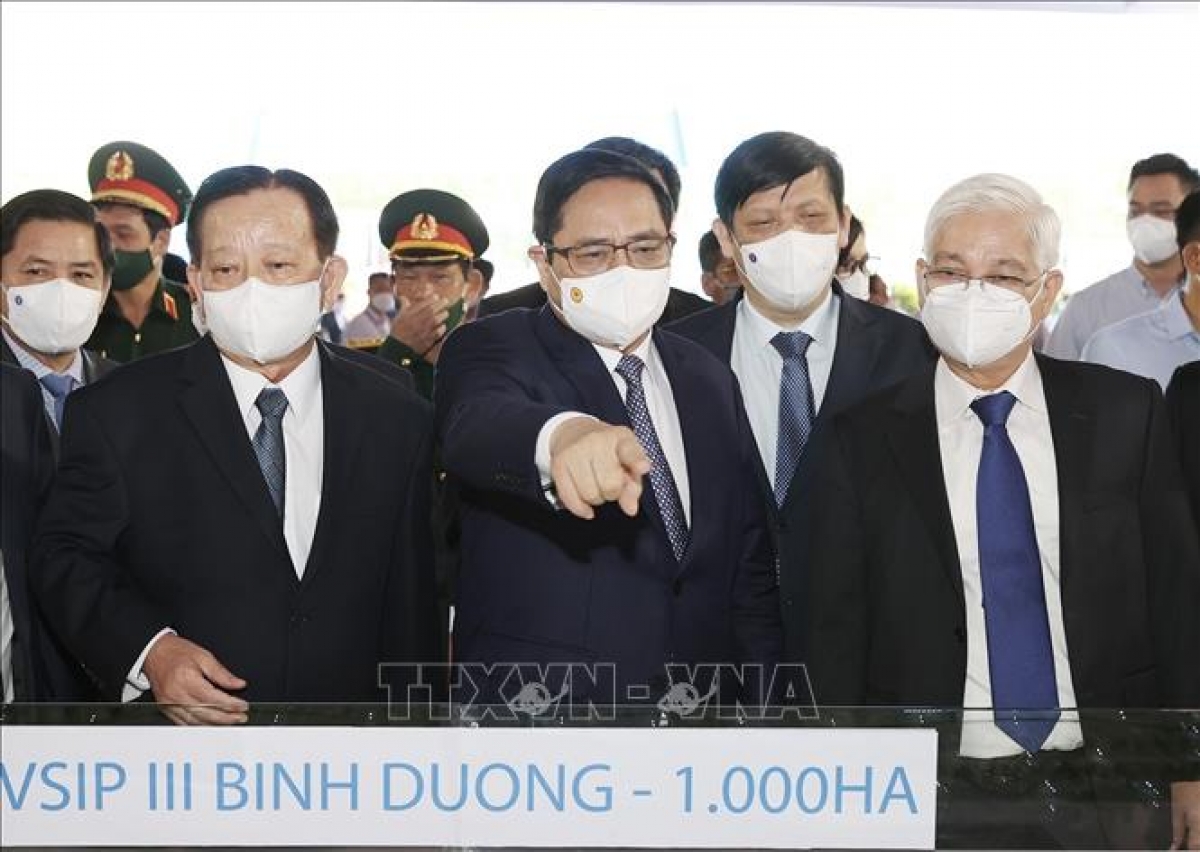 Thủ tướng dự lễ khởi công dự án khu công nghiệp Việt Nam - Singapore III Thủ tướng Phạm Minh Chính tham quan mô hình xây dựng Khu công nghiệp Việt Nam-Singapore (VSIP III). Ảnh: TTXVN
