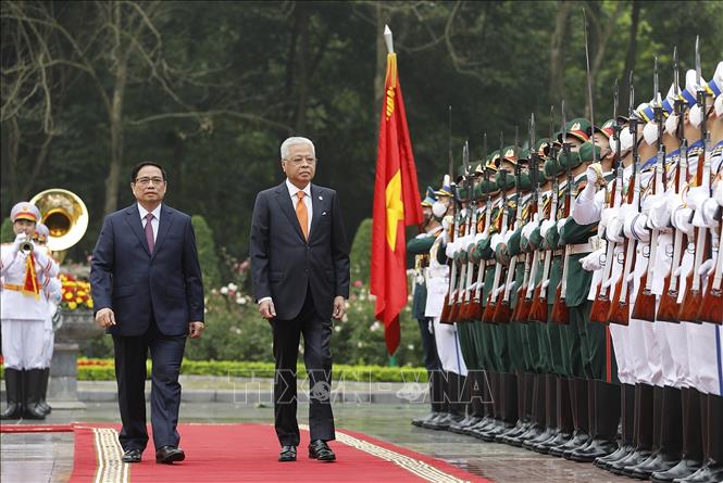 Thủ tướng Phạm Minh Chính chủ trì Lễ đón Thủ tướng Malaysia Chú thích ảnh