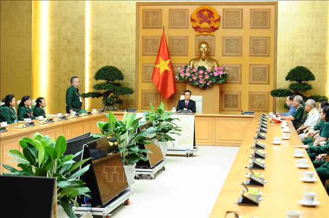Phó Thủ tướng Vũ Đức Đam tiếp Ban Liên lạc Giao Vận Quảng Đà Chú thích ảnh