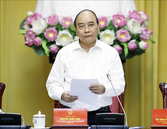 Chủ tịch nước chủ trì họp xây dựng Đề án Tổng kết 10 năm thực hiện Chiến lược bảo vệ Tổ quốc trong tình hình mới Chú thích ảnh