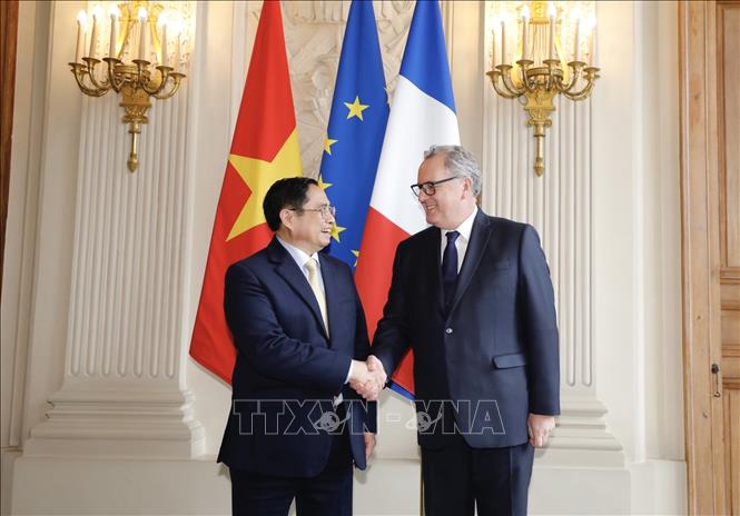 Thủ tướng Chính phủ Phạm Minh Chính hội kiến Chủ tịch Quốc hội Pháp Claude Bartolone Chú thích ảnh