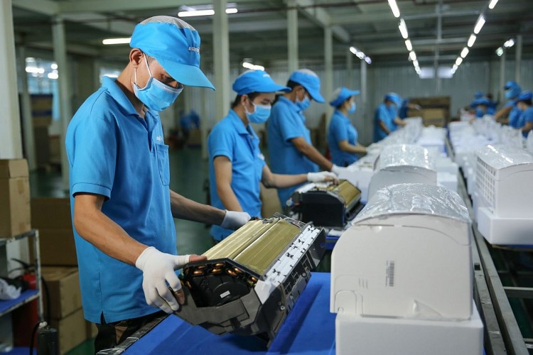 Doanh nghiệp FDI đã nỗ lực vượt qua khó khăn khi phải thắt chặt các biên pháp phòng, chống dịch COVID-19. Ảnh minh họa.